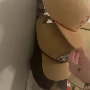 Hat Organizer for Baseball Caps Wall-Mounted Multilayer Adjustable Hat Rack with Strong Adhesive Hold up to 10 Hats for Door Closet Cap Storage [0]