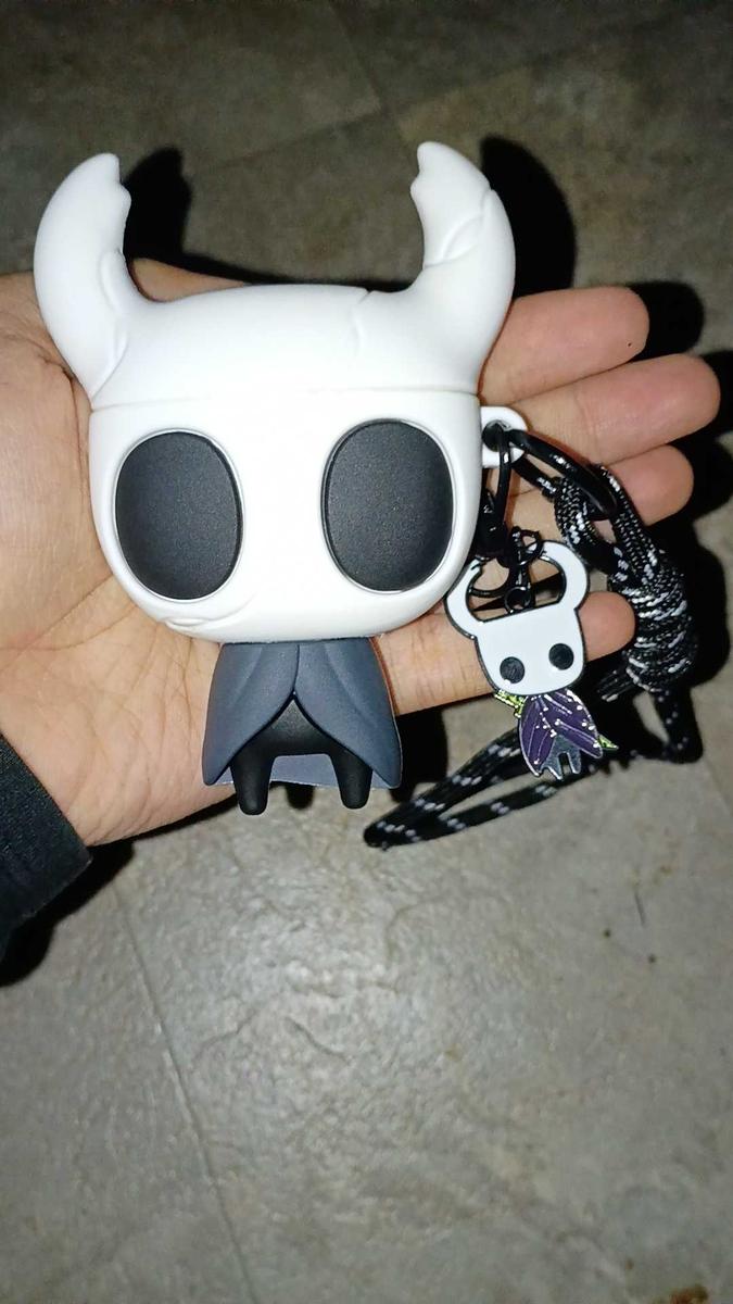 Item: Hollow Knight (includes pendant and lanyard), AirPods 4