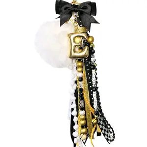 Junk Keychain in Black Gold Glitter and White Ribbon with Specialty Initial and Black Bow for Stylish Accessories