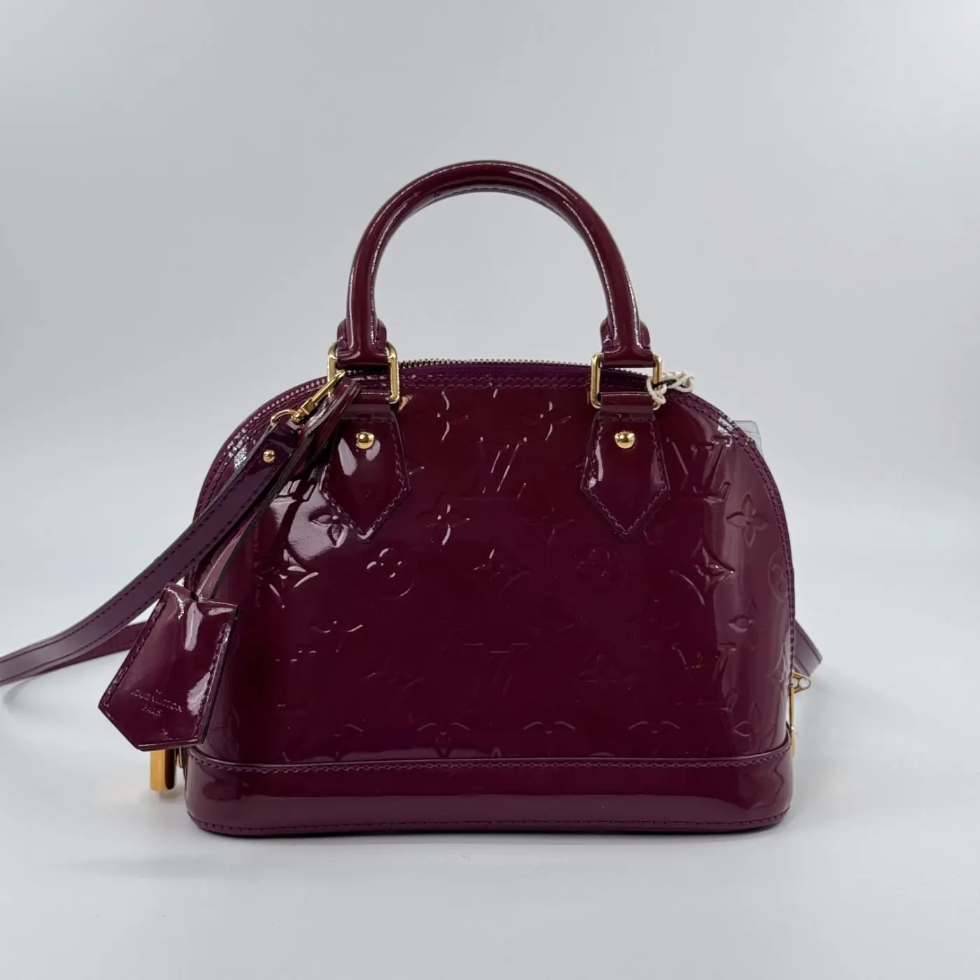 Pre-owned Louis Vuitton Leather Clutches & Wristlets Pre‑owned Alma BB Purple Monogram Vernis Patent Handbag #9210251888857015