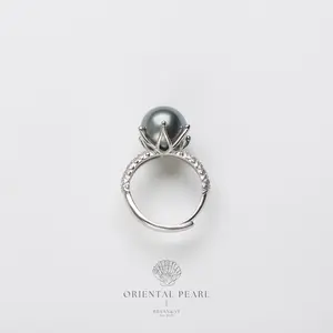 BT003-The 'Midnight Bloom' Tahitian Pearl Coronation Ring – A Luminous Orb in a Scintillating Crown. Tahitian Pearl Ring, Black Pearl Ring, Statement Cocktail Ring, Crown Setting Ring, Adjustable Pearl Ring, Luxury Floral Jewelry, Designer Ring