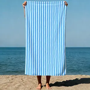 Vertical blue stripes on a light blue background, minimalist geometric art style. Sand-Free Beach Towel | Ultra-Light Microfiber | Quick-Dry, Compact for Travel