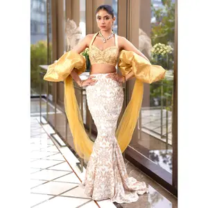 Nisha white gold lehenga set