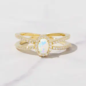This exquisite and elegant ring, set with synthetic opals and cubic zirconia, is a stylish choice for stacking. Perfect for engagements, wedding anniversaries, birthday gifts, parties, and evening wear – a high-quality piece of women's jewelry.