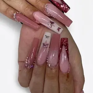 Elegant Pink Glitter Nails with Butterfly Design and Rhinestones for a Chic Look