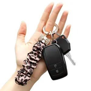 JOYTUTUS Bowknot Scrunchie Wrist Strap with Rhinestone Butterfly Knot Car Key Chain Gift Ideas Valentine's Day Travel Essential Elastic Pleated Lanyard