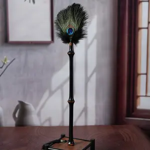 Vintage peacock feather duster with bamboo handle, elegant home decoration, practical handmade peacock feather brush, stylish bamboo duster, a must-have for Bohemian style homes.