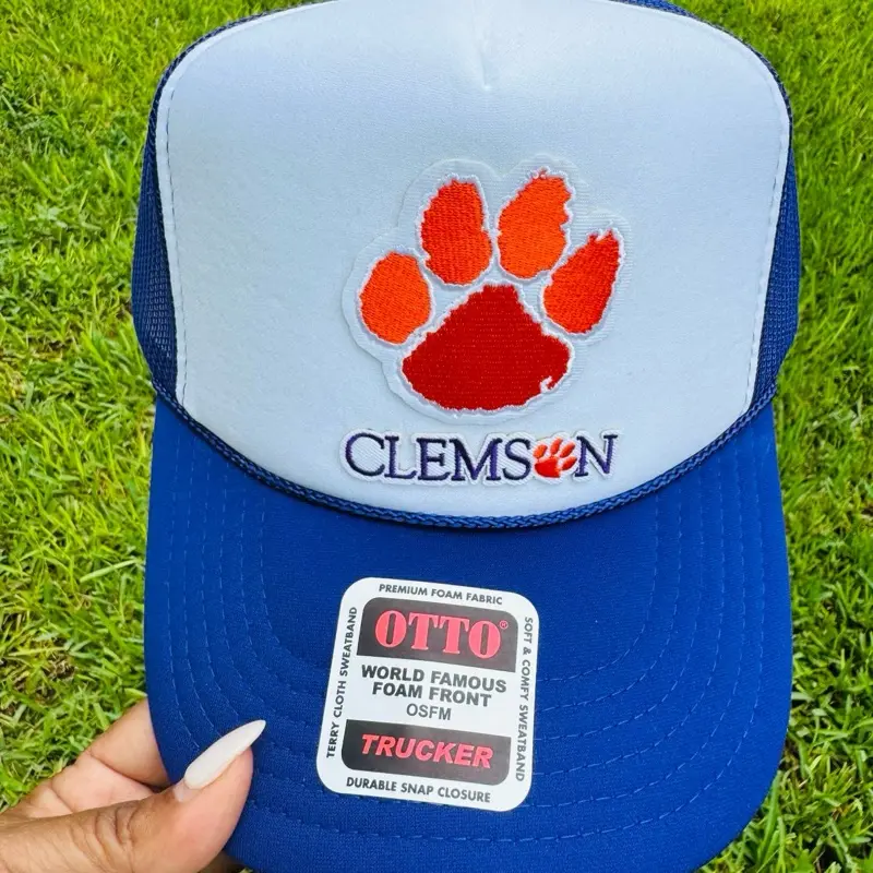 Otto Clemson University Game Day Hat - Blue & White Trucker Cap with Orange Paw Print Logo