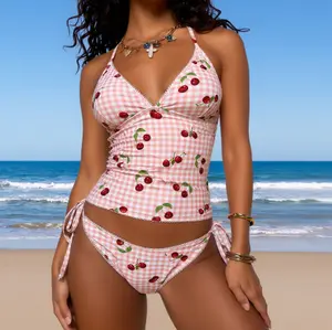 Cherry Gingham Print Halter Two Piece Tankini Swimsuit Halter V-neck ruched tank top with pink plaid and cherry print, paired with matching side tie high cut bikini bottoms Summer Vibes
