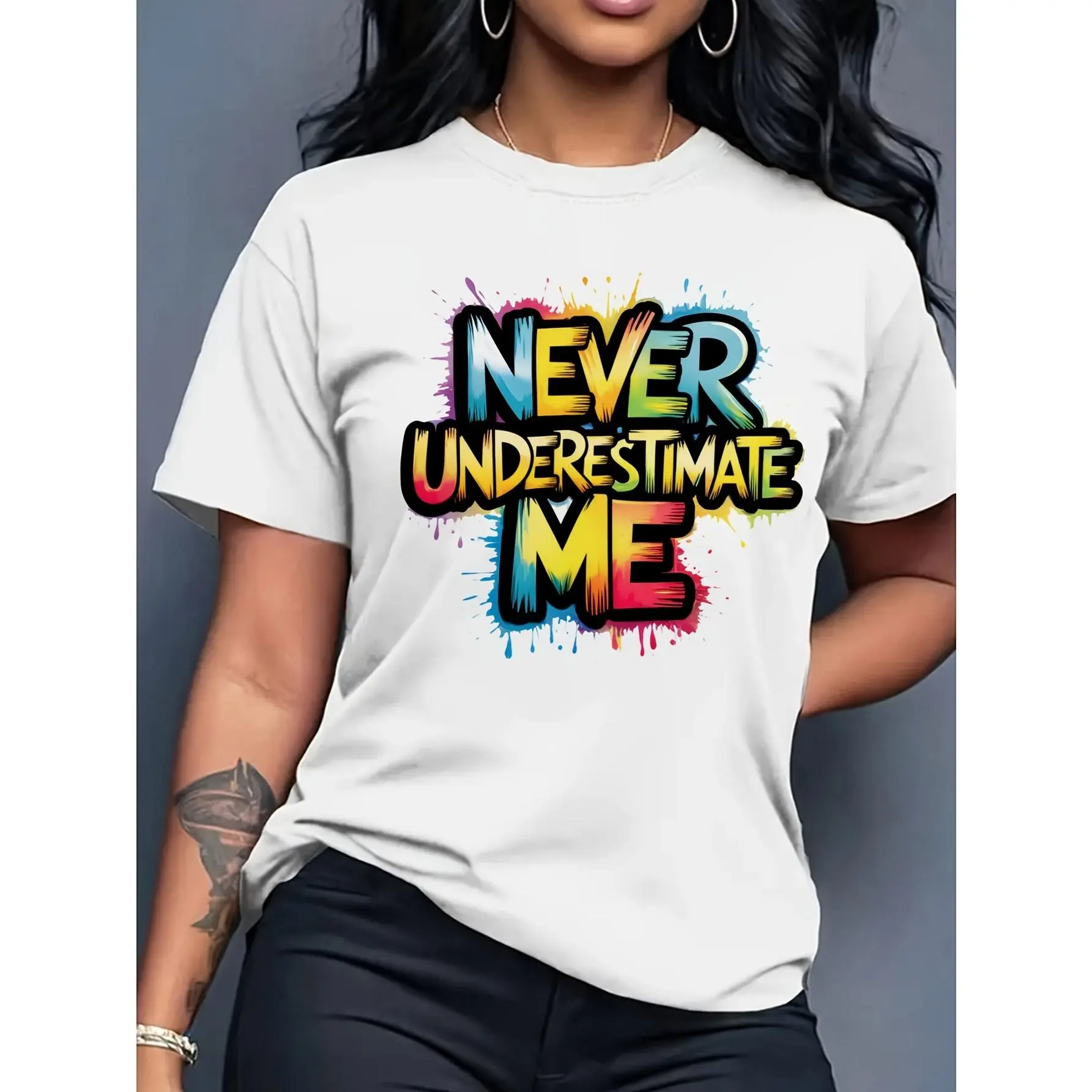 Women's "Never Underestimate Me" Graphic Short-Sleeve T-Shirt - Colorful Splatter Print, Breathable Round Neck, Medium Stretch, Machine-Washable, Summer Streetwear, Lady's Confidence Statement Top