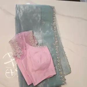 Seagreen Organza Glass Tissue With Mirror Work and BabyPink Net Blouse