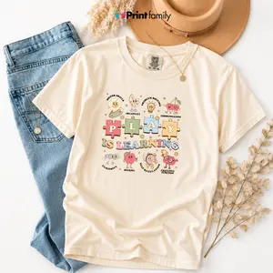 Comfort Colors Autism Awareness Shirt, Play Is Learning Teacher Tee, Pediatric Therapy Graphic T-Shirt, Occupational Therapist Shirt, Special Education Teacher Tee, Cute Retro Learning Shirt, Soft - Printfamily