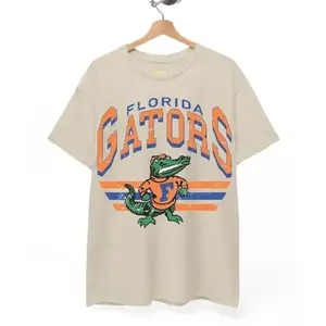 Retro College Football Mascot T-Shirt – Classic unisex cotton tee in Sand Color. Perfect for football fans who love vintage style!, Football T-shirt - MB