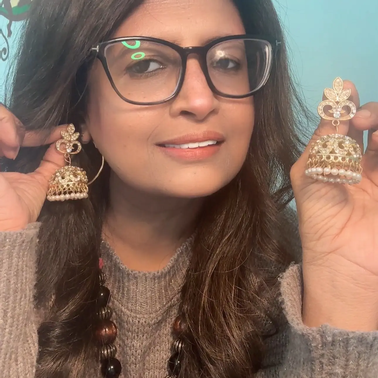 Dull Gold and White Pearl Drops Jhumka Earrings