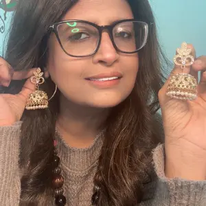 Dull Gold and White Pearl Drops Jhumka Earrings