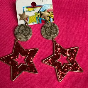 Red star GG earrings