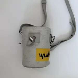 Pre-owned Louis Vuitton Coated Canvas with Leather Trim Crossbody Bags Chalk Nano Bag Monogram Canvas White Crossbody Mini Bucket