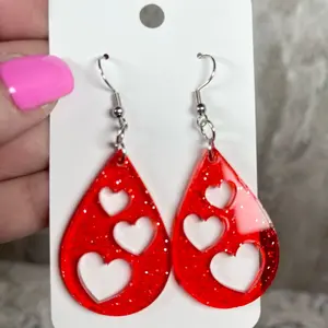 Red glitter gel cutout heart earrings