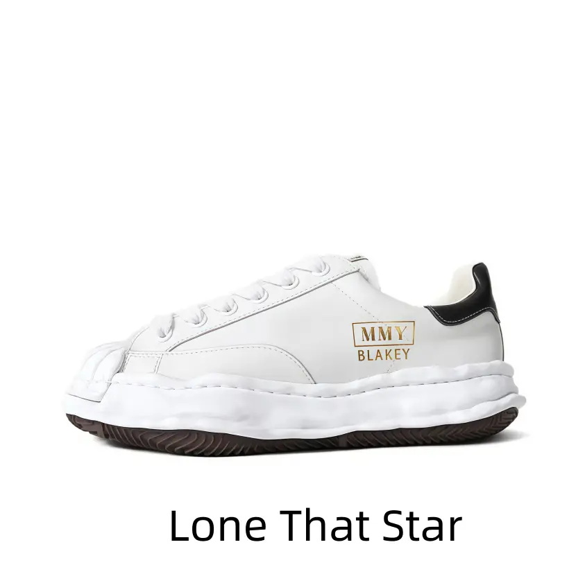 Minimalist all-white leather low-top casual sneakers with sculpted wavy thick midsole, black heel trim and textured brown rubber outsole, versatile daily footwear matching jeans, joggers and clean minimalist streetwear outfits