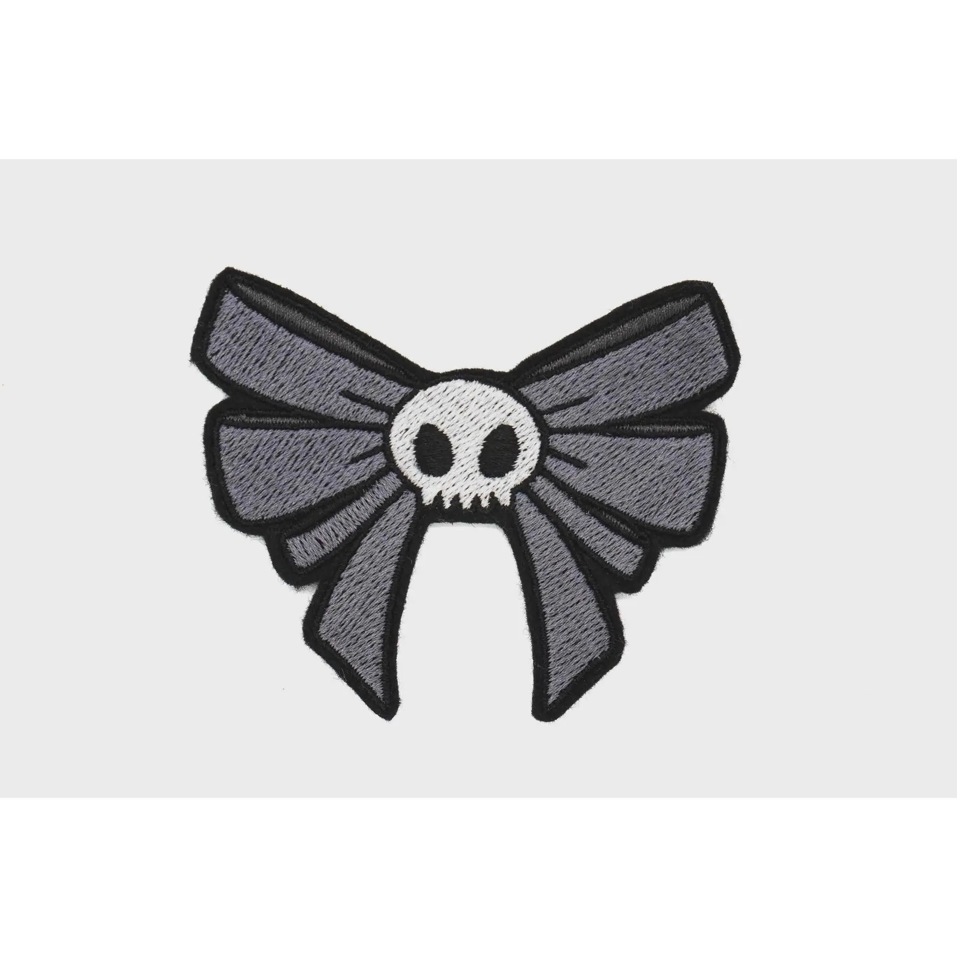 Skull Designs Gray Bow Iron-On Patch, Collectible Sports Applique