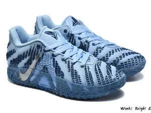 Light Blue and Dark Blue Low-Top Basketball Sneakers with Textured Overlay and ZoomX Cushioning