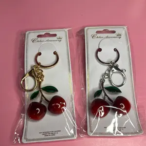 Chloe Accessory Cherry Keychains Gold and Silver with Green Leaves and Red Cherries for Stylish Accessory