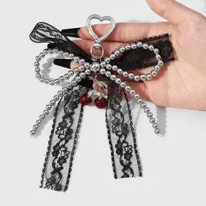 1 piece vintage, unique sweet‑cool dark gothic style handmade beaded charm featuring white faux pearls, CCB black‑and‑white lace ribbon bow, and a realistic cherry pendant; DIY keychain and bag charm; suitable for women’s everyday wear and as a holiday gi