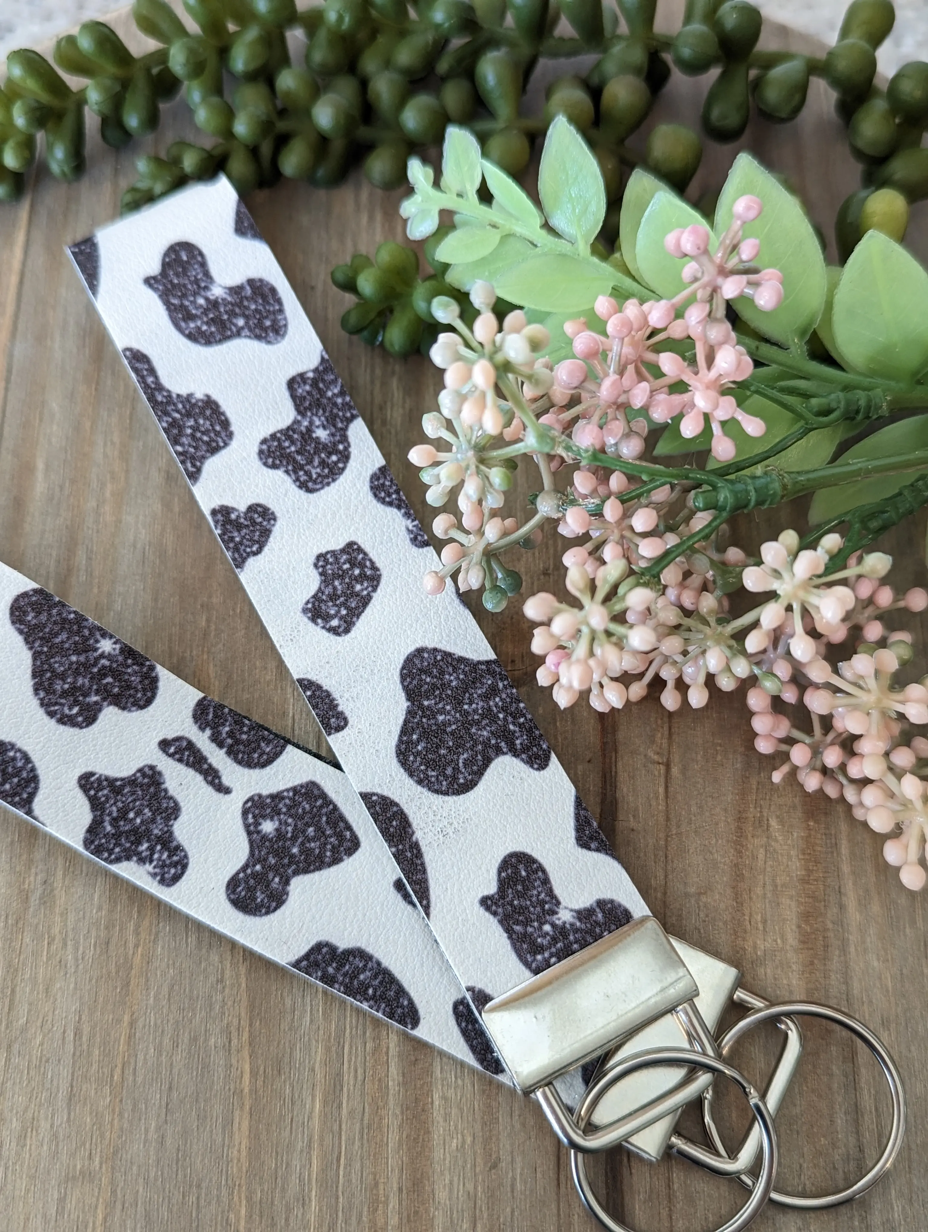 Cow Print Faux Leather Wristlet