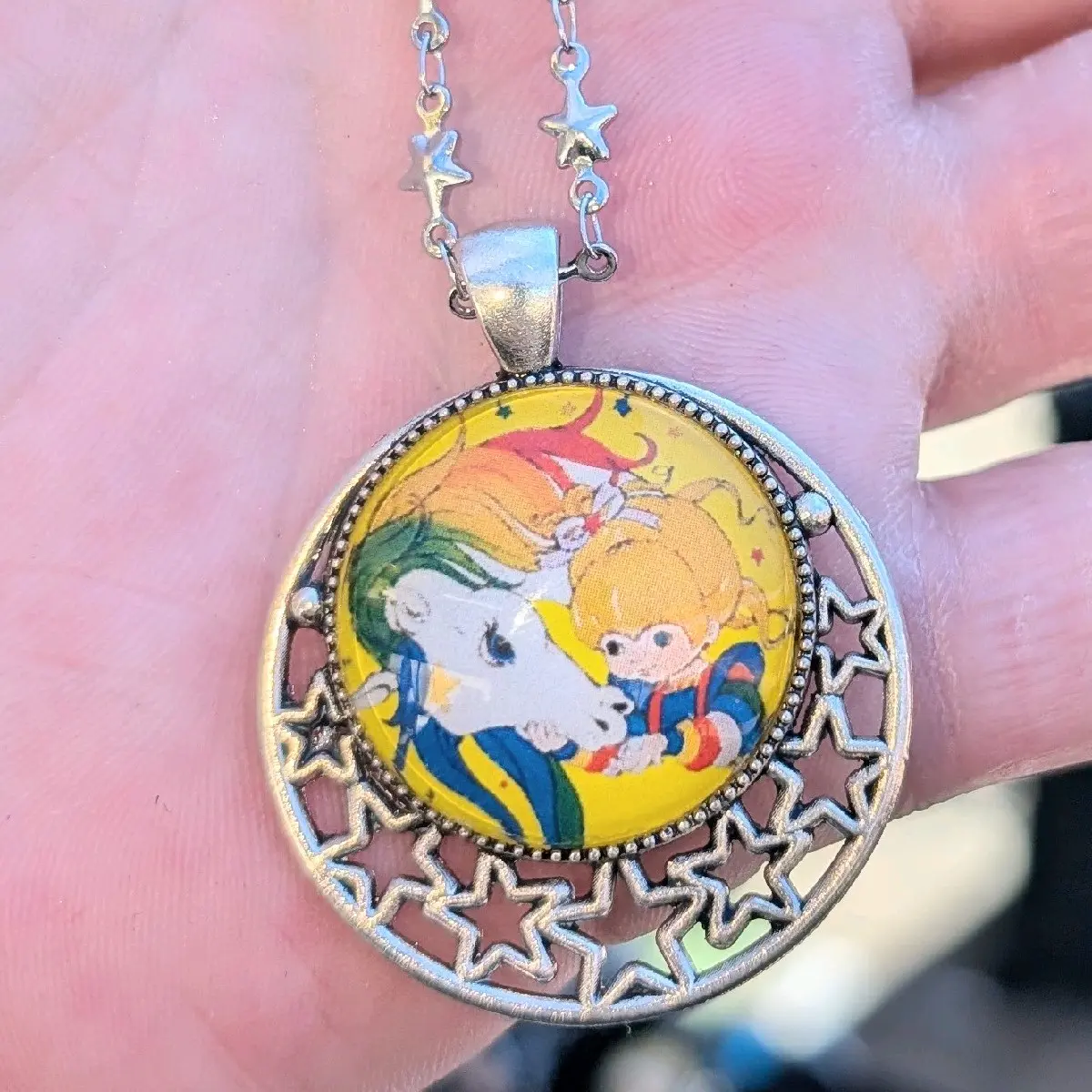 '80s rainbow Brite necklace on a stainless steel star chain