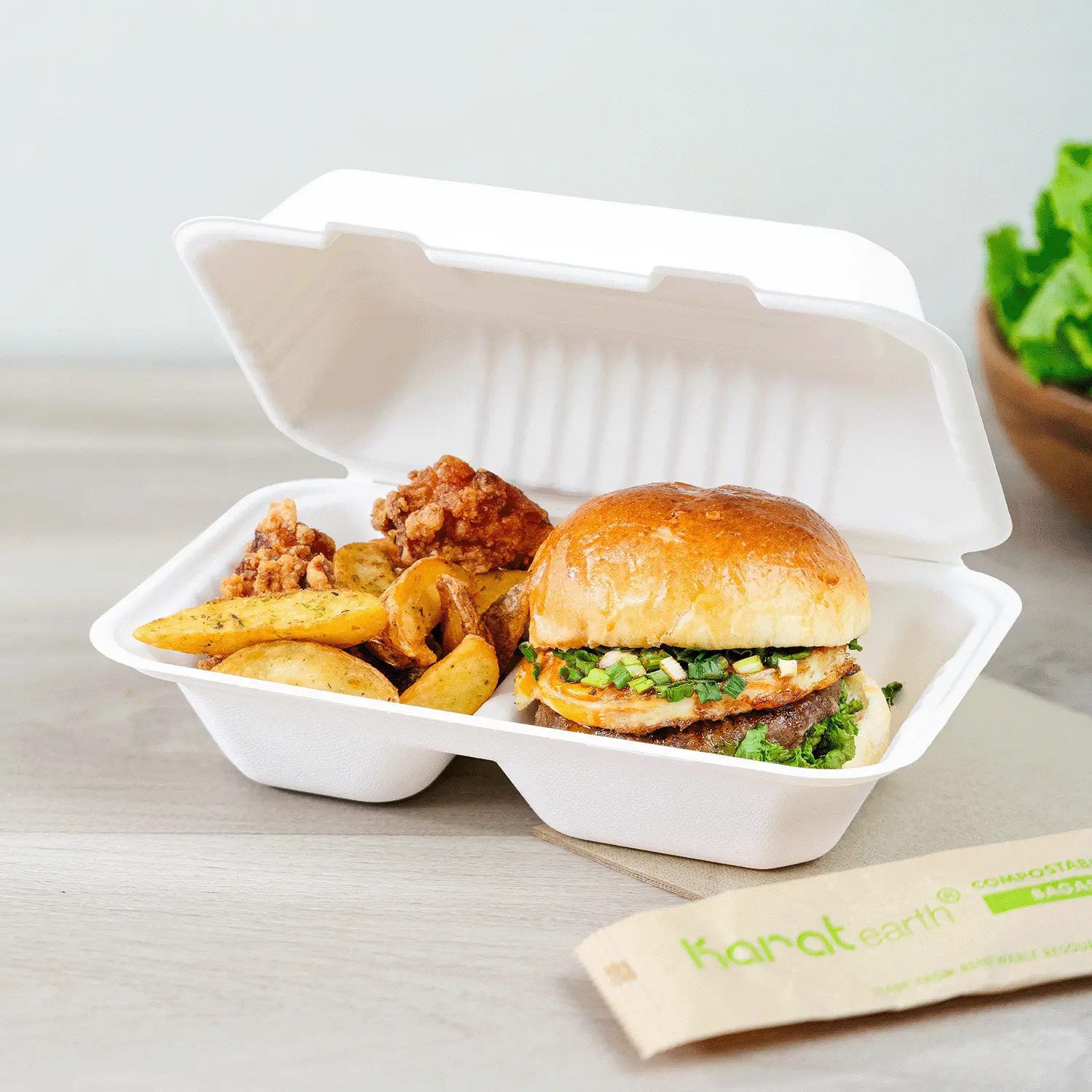 Karat Earth 9'' x 6'' PFAS Free Bagasse Hinged Container, 2-Compartment, White - 200 pcs Karat Earth 9'' x 6'' PFAS Free Bagasse Hinged Container, 2-Compartment, White - 200 pcs