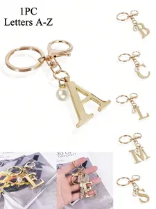 Elegant gold letter keychain, A-Z 3D letter pendants, alloy keychain with pearl decorations, trendy cute keychain, Keychain for bags, perfect as a bag, backpack, or car key accessory, ideal for daily use by women and also a great gift for couples