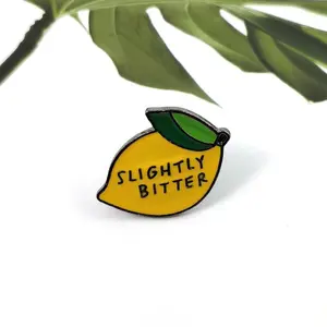 1-piece lemon drop brooch, a unique and cute lemon pin on a denim jacket, a unique dialogue opening line, a fun gift for friends and citrus enthusiasts