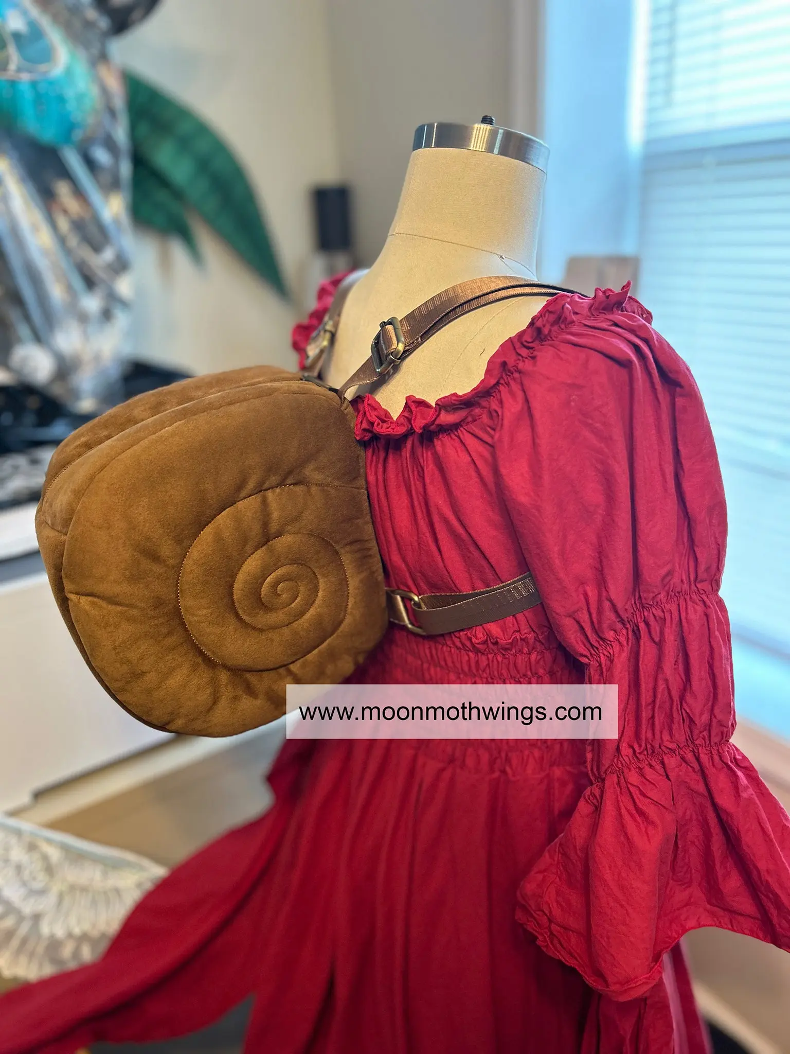 Structured Brown Snail Shell Backpack with Extra Storage and Zippered Pocket