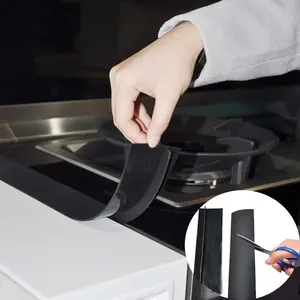 A packaged black silicone sealing strip, in individual packaging, in OPP transparent bags, preventing debris and objects from falling off. Suitable for the countertop of the kitchen stove. Easy to clean, waterproof and heat-resistant, Kitchen Accessories.