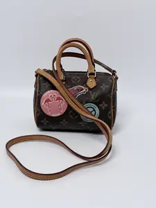 Pre-owned Louis Vuitton Monogram coated canvas Crossbody Bags Monogram Nano Speedy Patch Edition Crossbody Bag JA699LV