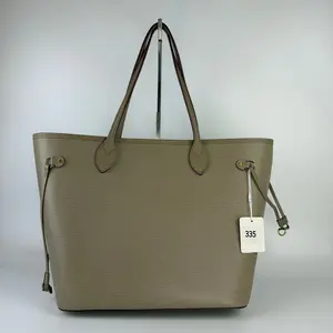Pre-owned Louis Vuitton 335 Epi leather Neverfull MM tote bag. 