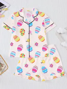 2-piece Easter egg printed children's short sleeved sleepwear set, Pajama set, seasonal new flame retardant children's sleepwear for home, new cardigan collar shirt top and loose elastic waist shorts set