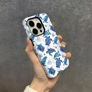 A durable 2-in-1 protective case with a turtle shell design, ocean blue background, and coral and seaweed patterns. It's compatible with iPhone 17/16/15/14/13/12/11 Pro Max/Plus/Pro and Samsung Galaxy S25/S24/S23 Ultra series. Also suitable for couples.