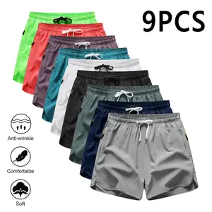 9-Pack Men’s Quick-Dry Athletic Shorts with Elastic Waist, lightweight and wrinkle-resistant, perfect for gym workouts, running, everyday wear, and summer casual outfits.