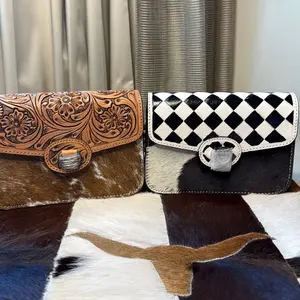 Harlequin Crossbody Bag - Black and White Checker Pattern with Cowhide Accents Secure Buckle Closure Elegant Design Compact Size Versatile Accessory