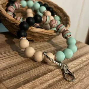 Stretchy Wristlet Keychain Made with Silicone Beads in Assorted Colors and Beige Accents