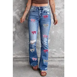 Sequin Bow Distressed Bootcut Jeans