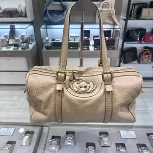 Pre-owned GUCCI Guccissima Embossed Leather Shoulder Bags Guccissima Small Britt Boston Bag in Beige – Style 170010