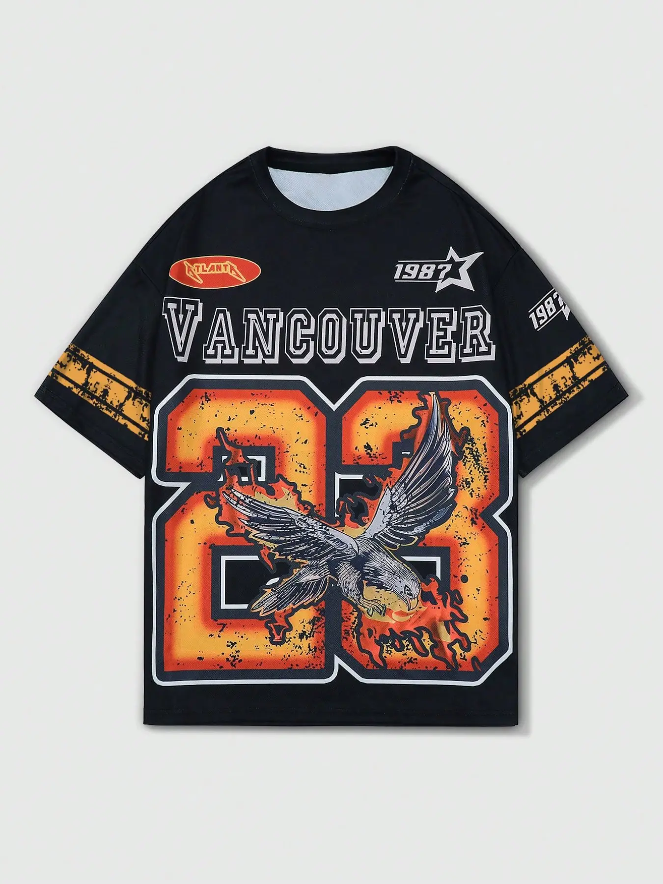 Men’s black graphic print T-shirt, “Vancouver 23” eagle design, 1987 vintage style, crew neck, short sleeves, yellow stripe cuffs, retro sports aesthetic, streetwear vibe, relaxed fit, casual everyday wear