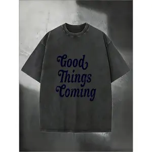 Washed T-shirt with Vintage Style Bold Navy Blue Cursive Lettering 'Good Things Coming' Graphic Print. Oversized Crew Neck Men's Top with a Faded Distressed Aesthetic. Soft Breathable Fabric, Relaxed Fit Urban Fashion Essential for Casual Daily Wea