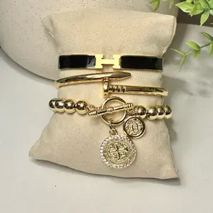 Shop The Look - 14k Gold-Plated Toggle Bracelet, Nail Bangle, and Letter Bangle Jewelry Stack Set