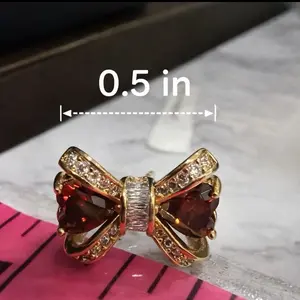 B74. Mini Bow Stud Earrings/laminado 14k