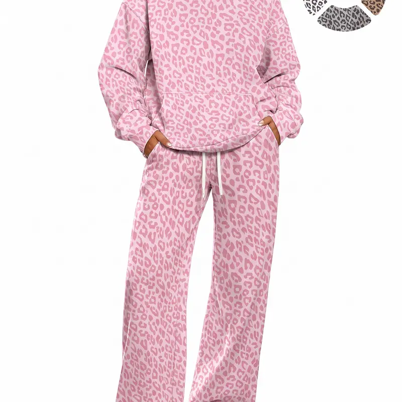 Women’s casual leopard-print set featuring a hooded sweatshirt with kangaroo pockets and a relaxed drop-shoulder long-sleeve fit; matching sweatpants have an elastic waistband with drawstring, a loose, drapey straight cut, and practical side cargo pockets