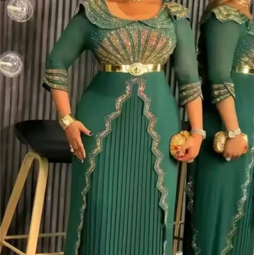 Women's Formal Dress in Rich Teal with Embellished Sleeves and Pleated Skirt for Elegant Occasions