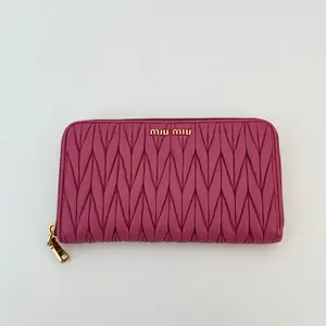 Pre-owned miu miu lambskin Mini Bags Matelasse Zip Around Long Wallet Pink